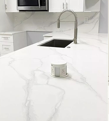 Calacatta quartz countertop design with white background and grey veining