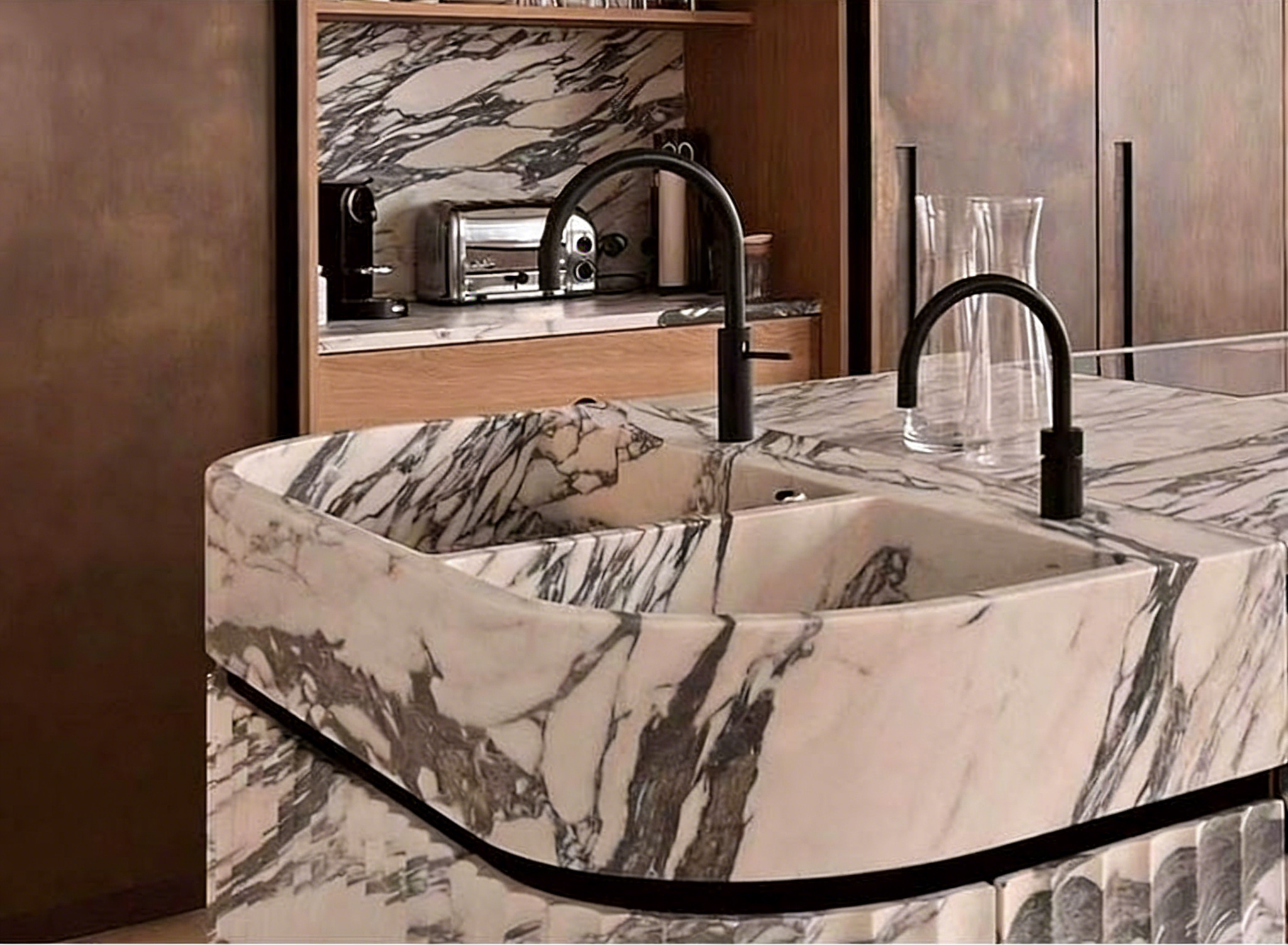 Arabescato marble kitchen island with integrated sink and grille side panel