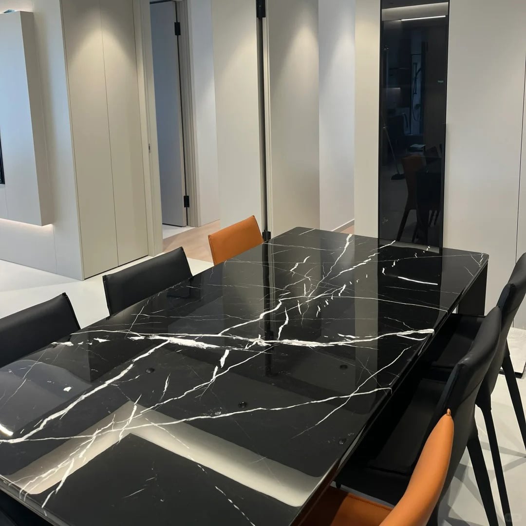 Nero Marquina Marble dining table with black surface and white veins