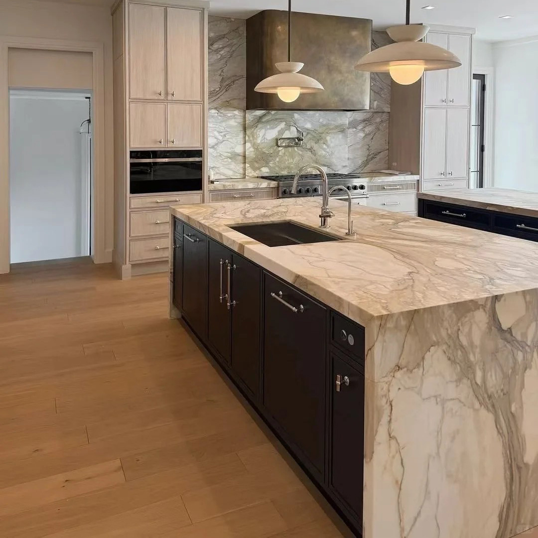 Calacatta Gold Marble feature wall and luxury stone interior design