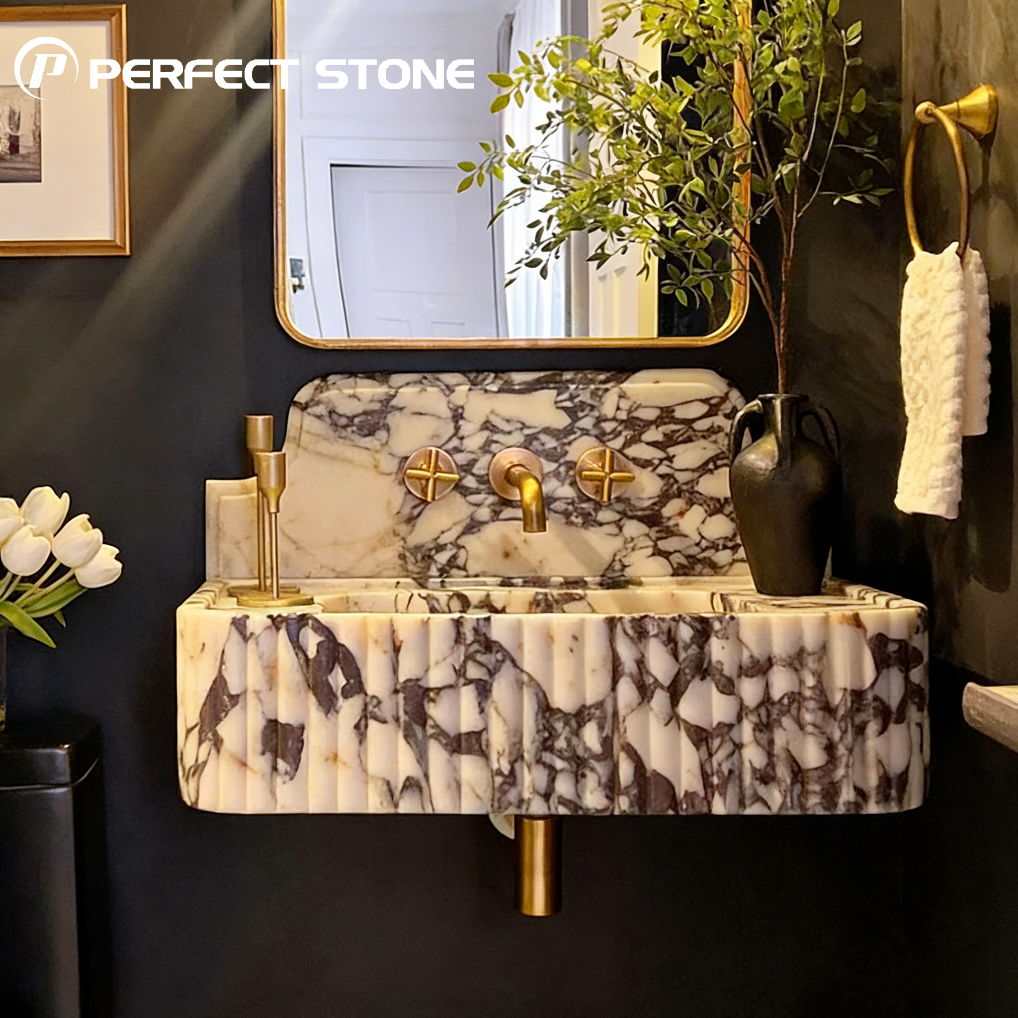 Calacatta Viola marble vanity with wall mounted fluted front panel