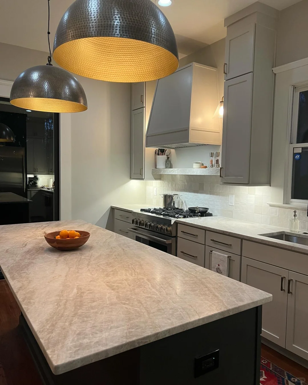 Taj Mahal stone countertops with warm gold veining