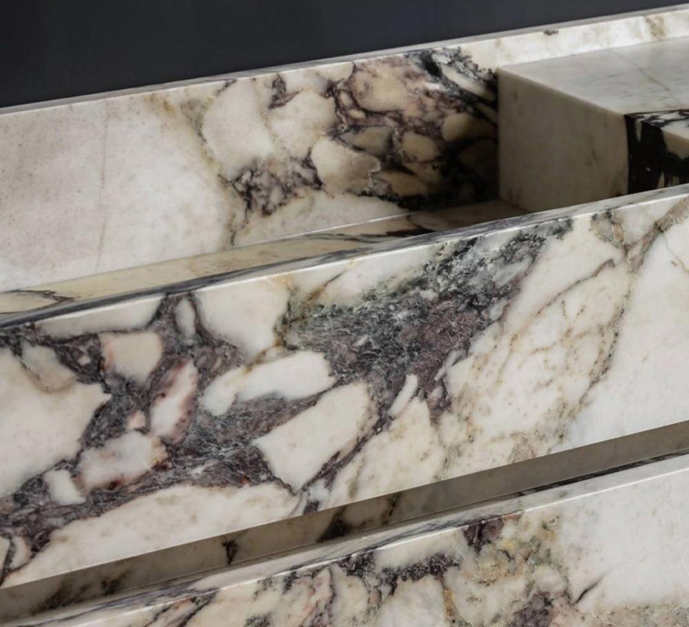 Calacatta marble Viola sink and vanity for boutique hotel bathroom