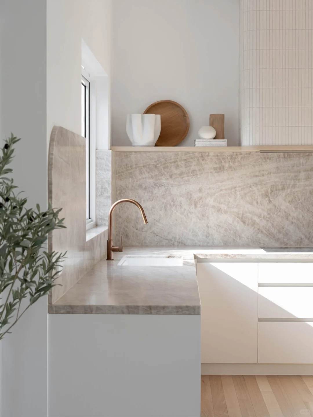 Taj Mahal Quartzite with white cabinets for modern kitchen design