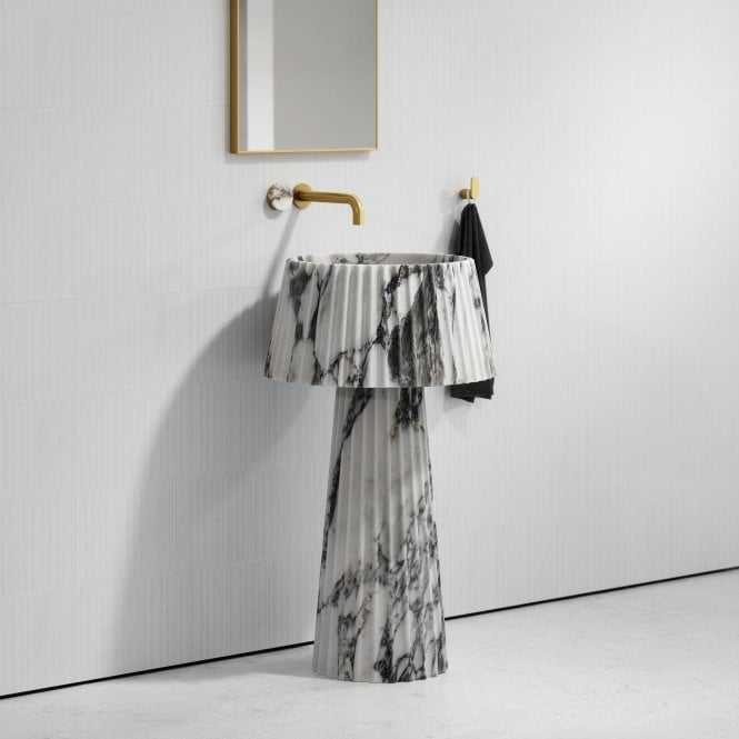 Arabescato marble sink with fluted pedestal design
