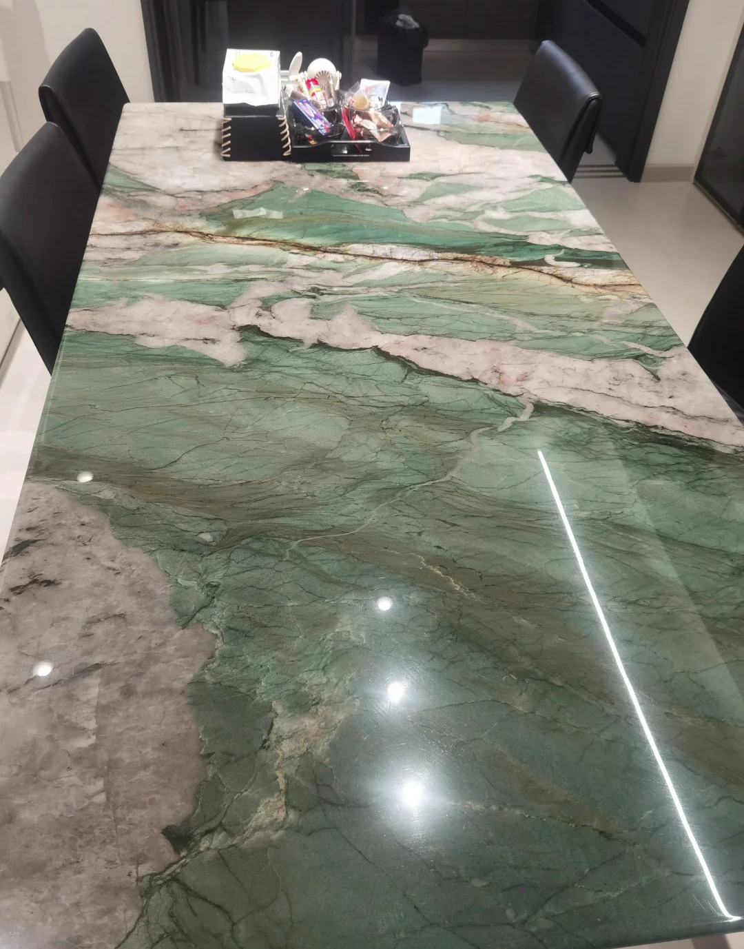Custom Patek Green Quartzite dining table for high-end interiors