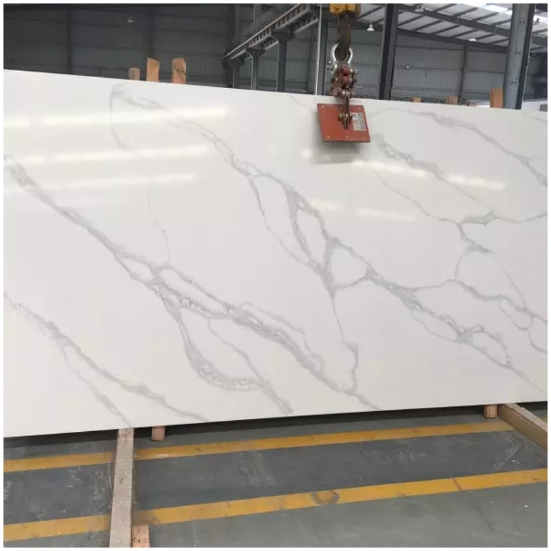 White Calacatta engineered quartz slabs in warehouse for wholesale supply