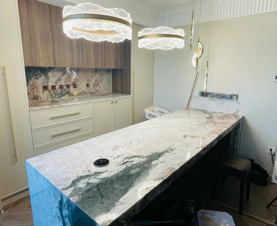 Pink marble island for open kitchen and villa interior decoration