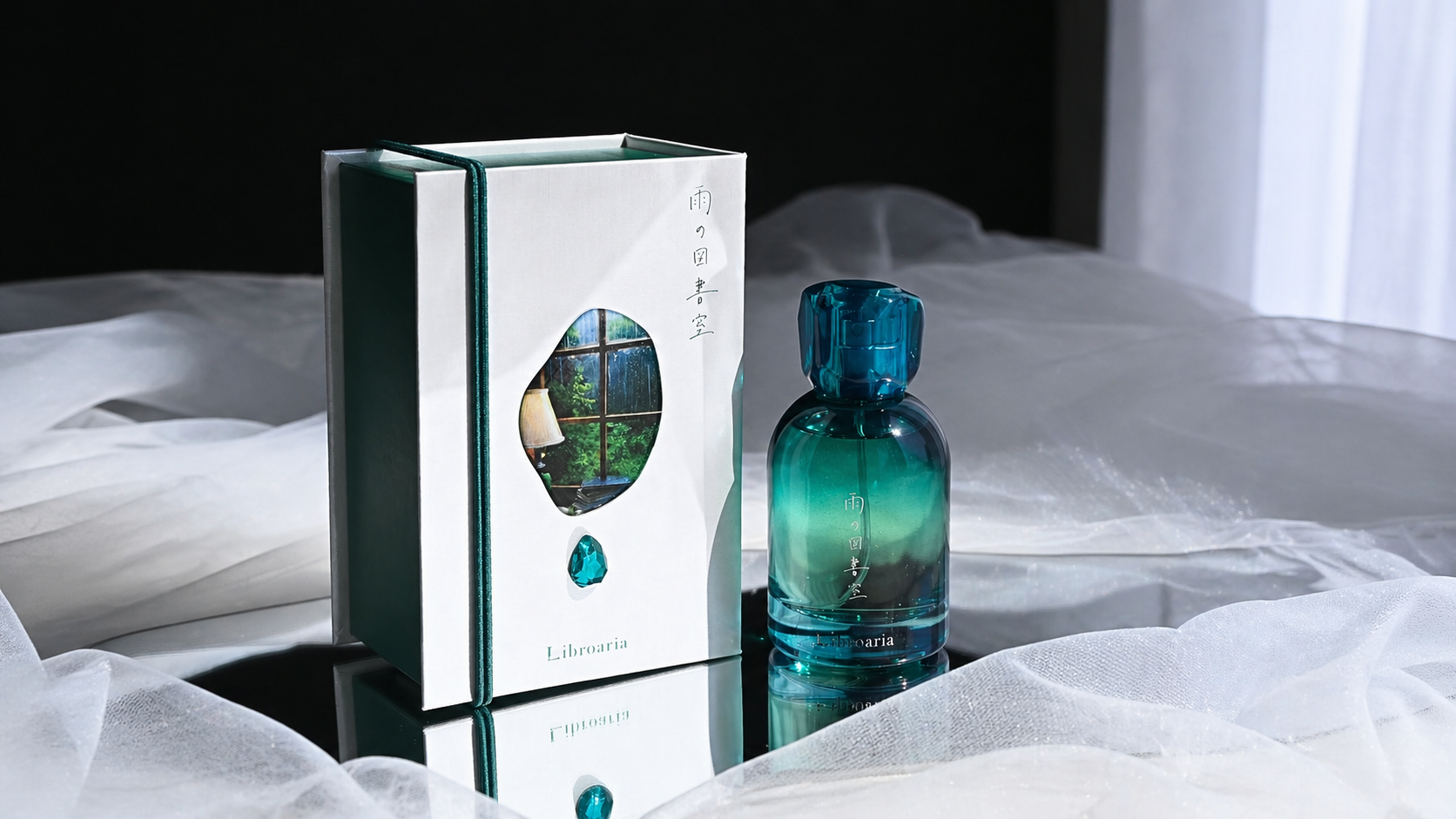 luxury-perfume-box-with-ribbon-and-acrylic-details.png