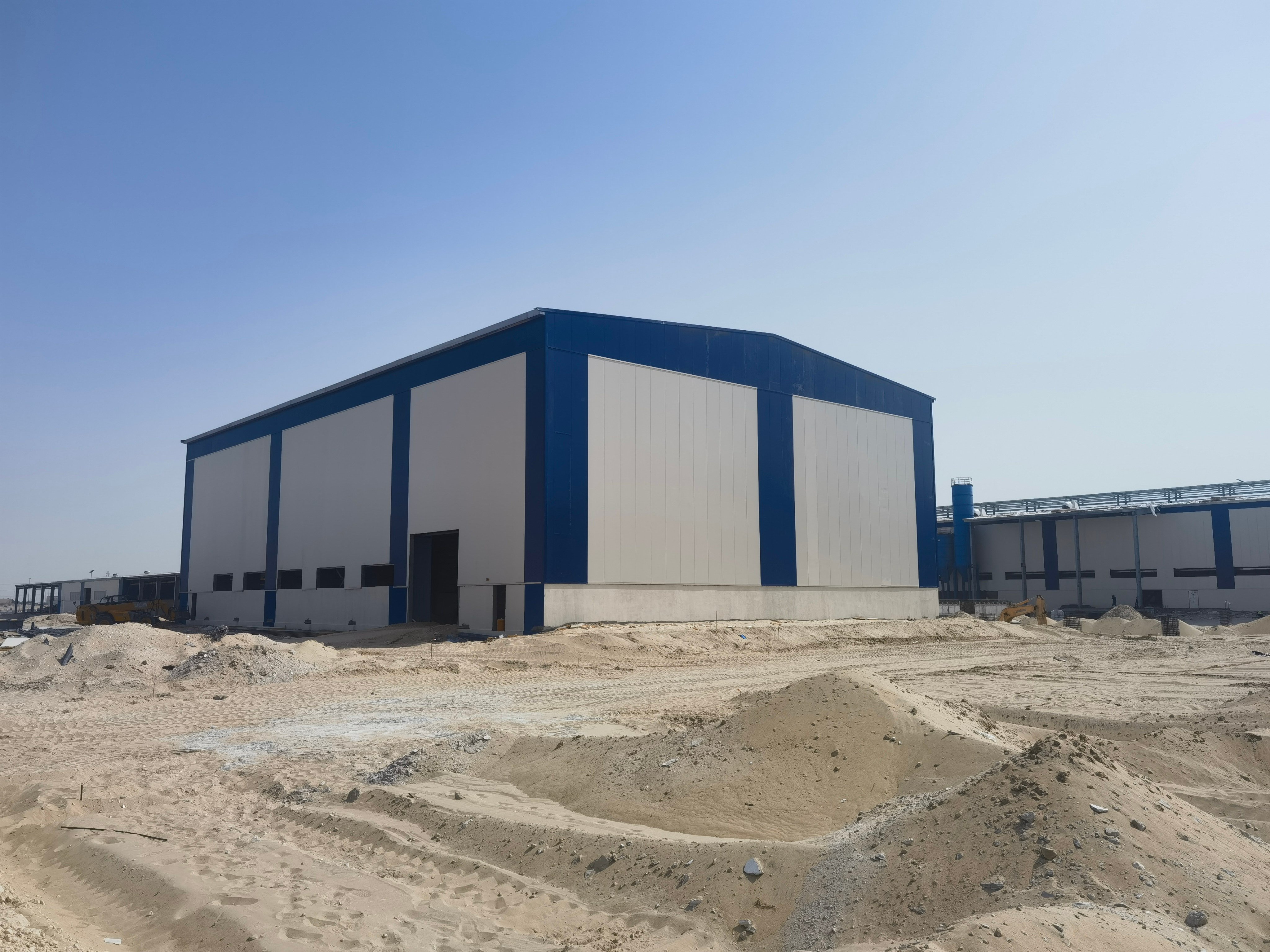 How to build a temporary warehouse on a construction site? Modular steel structure warehousing solution.