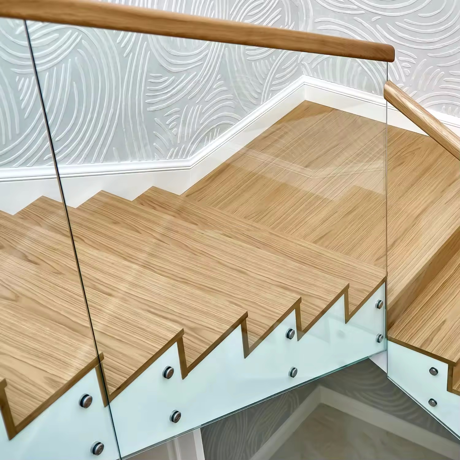 The versatile design possibilities of a long silver mirror wall.