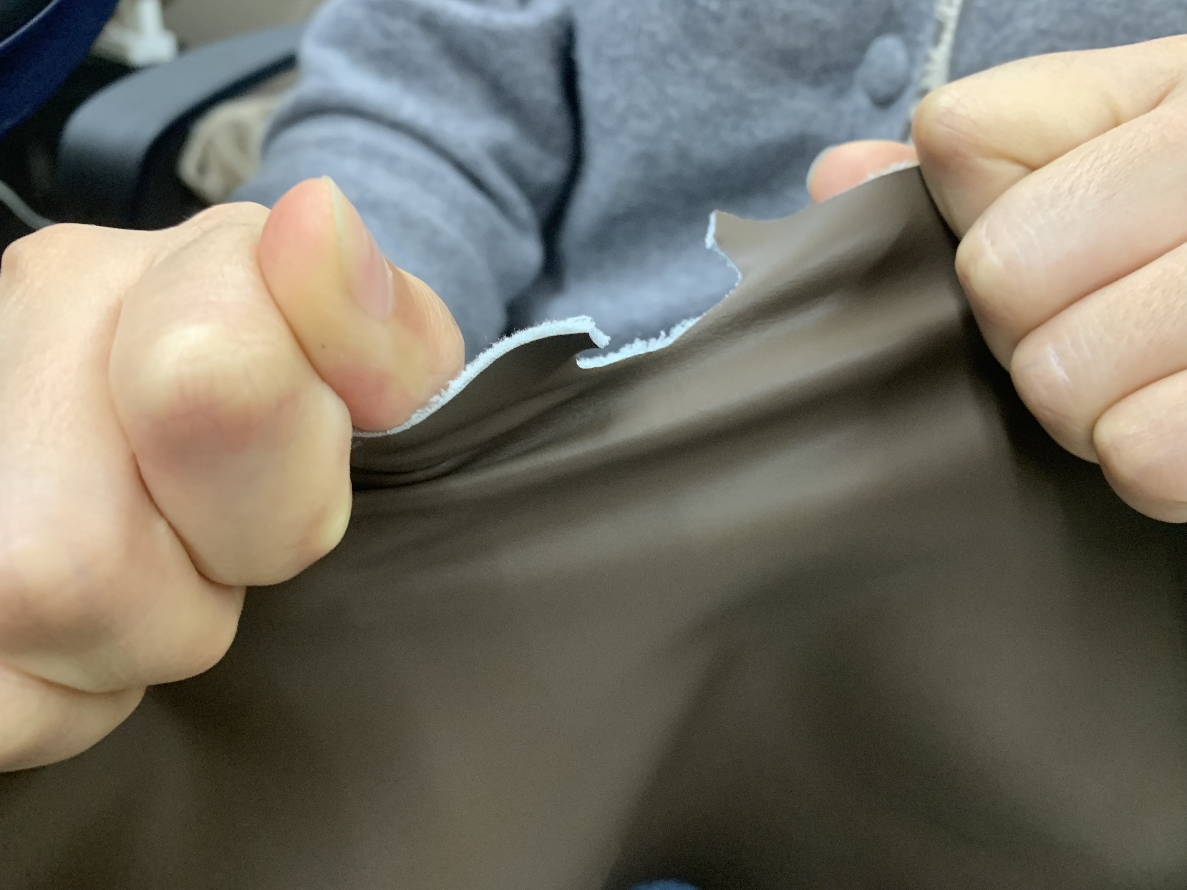 What determines the tear resistance of artificial leather?