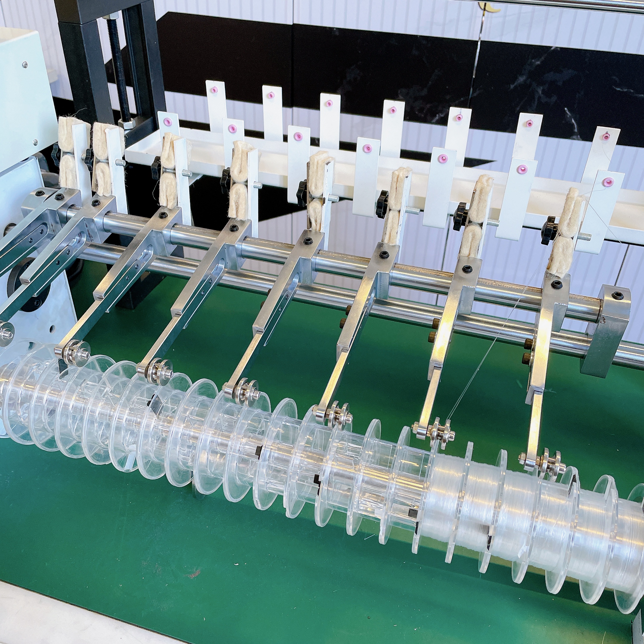 What Anti-Twist Mechanisms Are Critical in a Fishing Line Winding Machine?