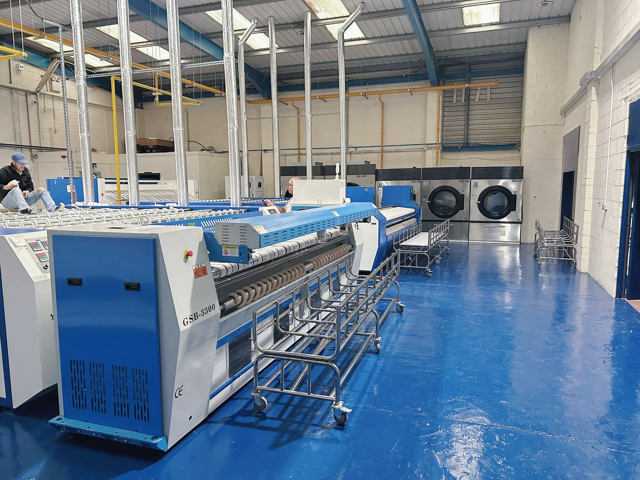 Why a Single-Station Bed Sheet Feeder Belongs in Your Laundry
