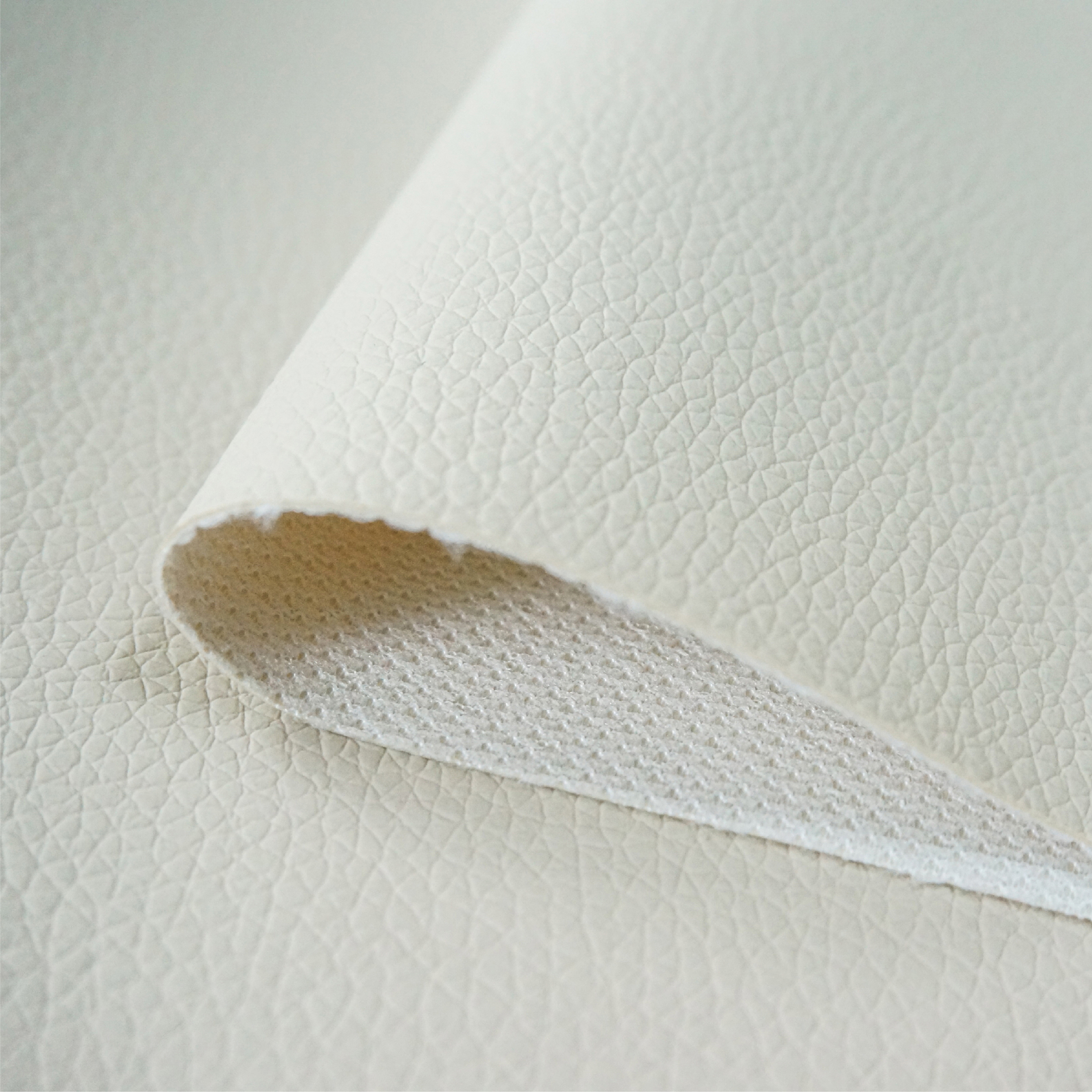 Customizable PVC Faux Leather Rolls: Microfiber Synthetic Rexine Fabric for Automotive Upholstery Applications manufacture