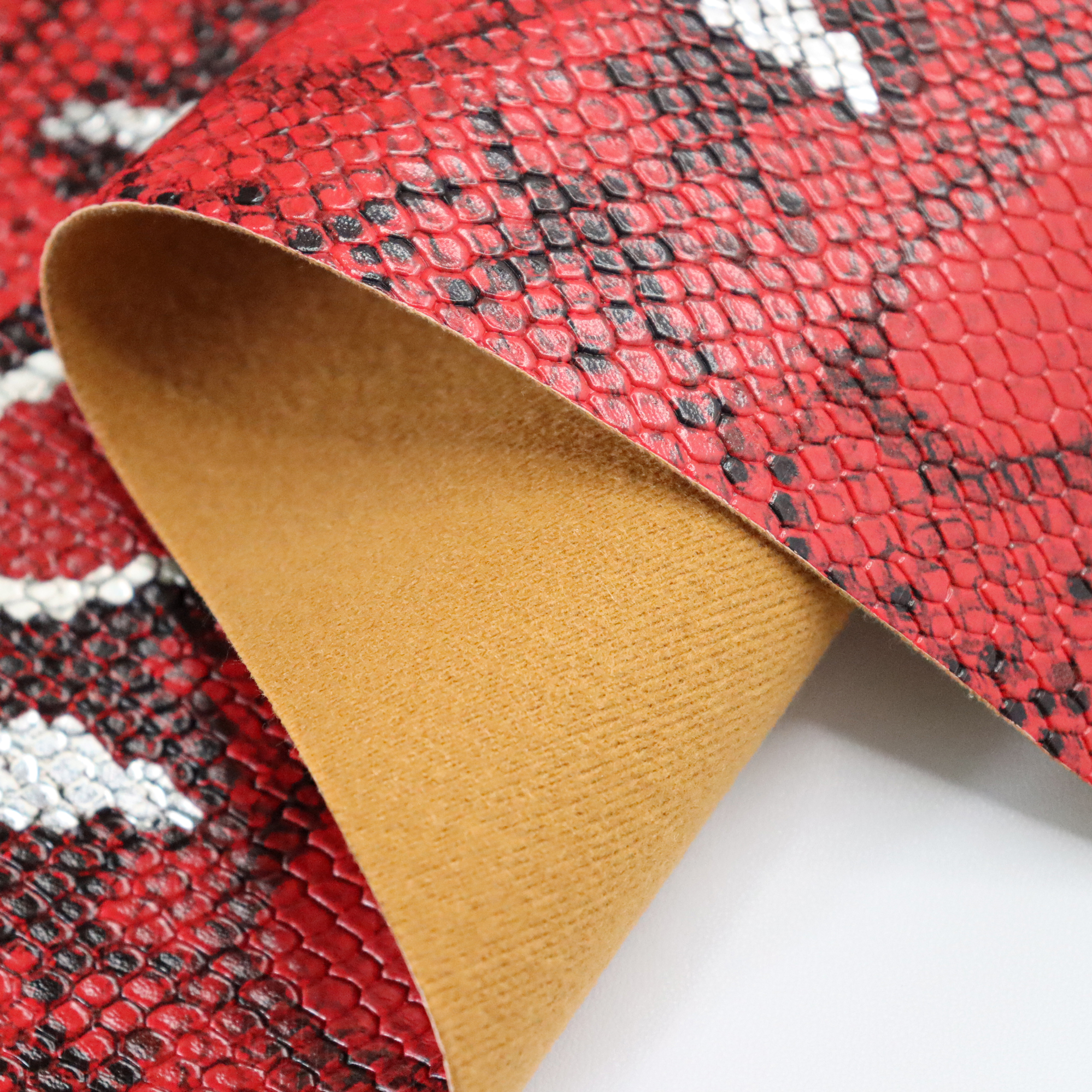 Premium Glossy PU Leather with Customizable Snake Skin and Animal Patterns for Clothing and Handbags factory