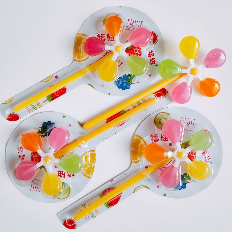 Hot Sales Wholesales Colorful Windmill Shaped Lollipop Hard Candy Fruity Flavor Sugary Ingredients Packaged in a Bottle supplier