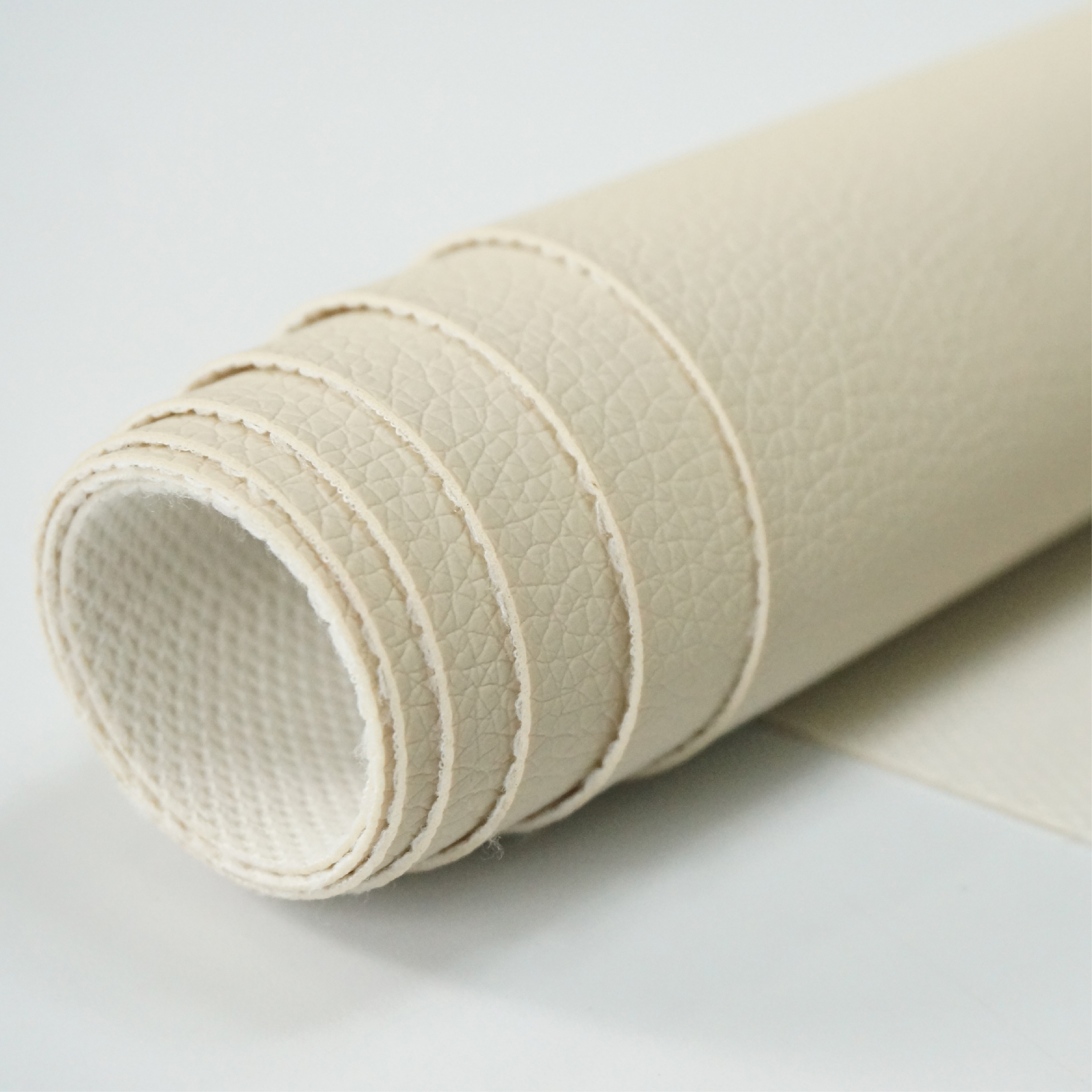 Customizable PVC Faux Leather Rolls: Microfiber Synthetic Rexine Fabric for Automotive Upholstery Applications manufacture