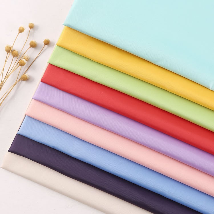 Environmental cloth plain woven 100 polyester semi dull 300t polyester taffeta fabric for down jacket details